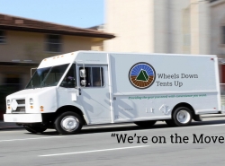 Wheels Down Tents Up van with slogan: Providing the gear you need, with convenience you want.